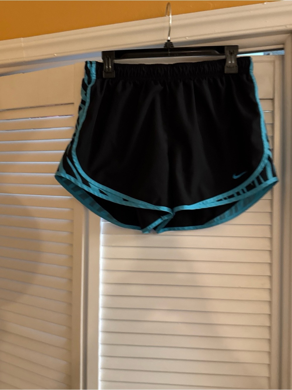 Nike Women's Black Athletic Shorts with Teal Trim